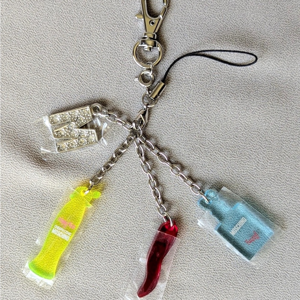 Moschino Phone Charm Accessory-Beauty Line